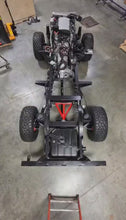 Load and play video in Gallery viewer, Land Rover Defender 90 complete turnkey rolling chassis with NEW LT1/10L90E Powertrain installed

